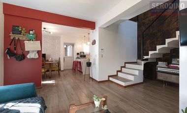 Sólida y cálida casa moderna