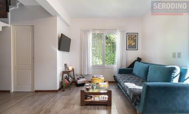 Sólida y cálida casa moderna