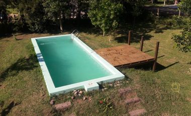 VENTA CASA UN DORMITORIO CON PILETA EN ROLDAN