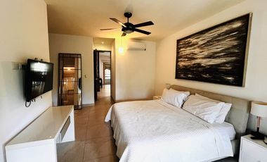 Penthouse caribeño con azotea privada en venta en Aldea Zamá