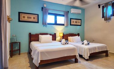 VENTA HOTEL EN TULUM A PIE DE PLAYA CON 16 HABITACIONES Y PENTHOUSE
