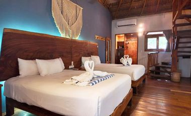 VENTA HOTEL EN TULUM A PIE DE PLAYA CON 16 HABITACIONES Y PENTHOUSE