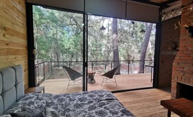 Cabaña en venta en Tapalpa. En el interior del bosque