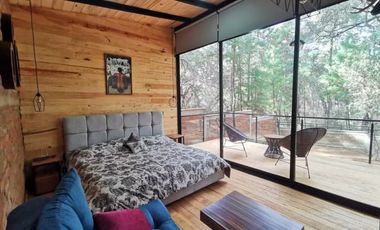 Cabaña en venta en Tapalpa. En el interior del bosque