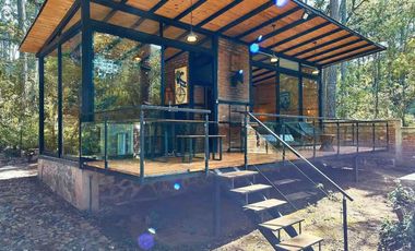 Cabaña en venta en Tapalpa. En el interior del bosque