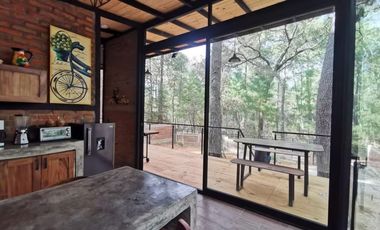 Cabaña en venta en Tapalpa. En el interior del bosque