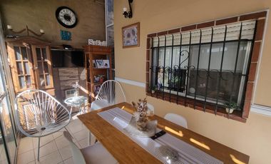 Casa a pasos estación Don Bosco, impecable