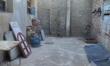 Venta Local comercial y 2 dptos en calle San Martin,  pleno centro de Neuquén