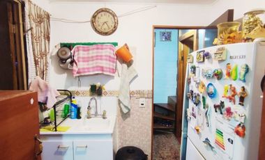 CASA  CON AMPLIACIONES REGULARIZADAS