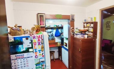 CASA  CON AMPLIACIONES REGULARIZADAS