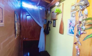 CASA  CON AMPLIACIONES REGULARIZADAS