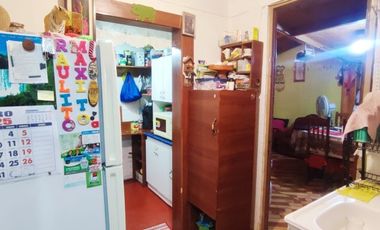 CASA  CON AMPLIACIONES REGULARIZADAS