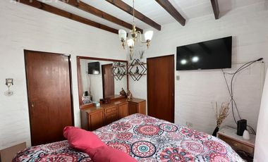 Venta casa 4 ambientes con quincho y cochera en Don Bosco