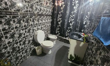 Venta casa de 5 ambientes con cochera y fondo libre en Quilmes Oeste