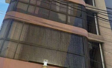 Edificio con uso mixto