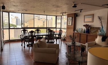 Edificio con uso mixto