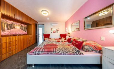 En venta: Casa Moderna en Residencial Valenia, Playa del Carmen