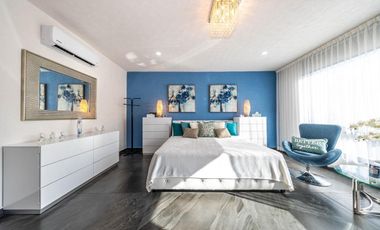 En venta: Casa Moderna en Residencial Valenia, Playa del Carmen