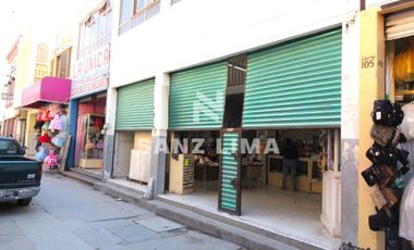 Centro Mercado: Amplio local en zona con alto flujo peatonal.