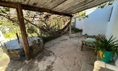 CASA EN SANTA MARIA DE PUNILLA A 200 MT DEL RIO COSQUIN Y 300MTS DE RUTA 38 TERRENO CON HERMOSA VEGETACIÓN SOBRE CALLE ADOQUINADA Ref 1832