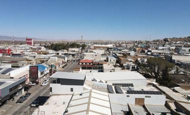 Edificio de 4 pisos, calle principal excelente ubicación