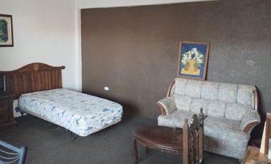 Edificio de 4 pisos, calle principal excelente ubicación