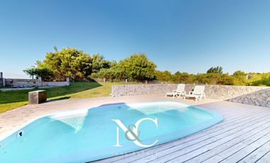 Casa en venta en Costa Esmeralda con Fondo a la Cancha Golf