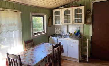 CASA CON AMPLIO TERRENO AL LADO TERMINAL DE BUSES RIO BUENO