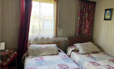 CASA CON AMPLIO TERRENO AL LADO TERMINAL DE BUSES RIO BUENO