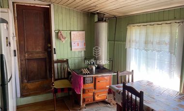 CASA CON AMPLIO TERRENO AL LADO TERMINAL DE BUSES RIO BUENO