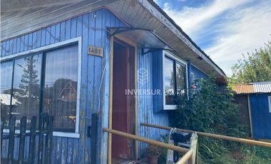 CASA CON AMPLIO TERRENO AL LADO TERMINAL DE BUSES RIO BUENO