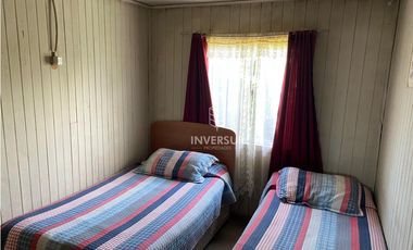 CASA CON AMPLIO TERRENO AL LADO TERMINAL DE BUSES RIO BUENO