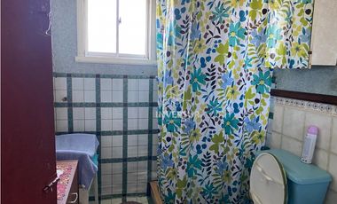 CASA CON AMPLIO TERRENO AL LADO TERMINAL DE BUSES RIO BUENO