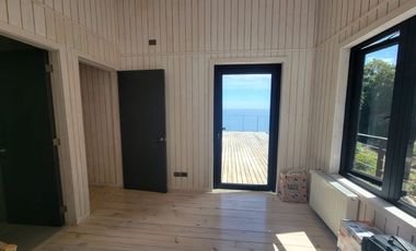 Espectacular casa con increíble vista al lago Llanquihue sobre terreno de 1,1 hectárea