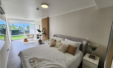 Beachfront at The Palms – 1BR + Den with Ocean Views!