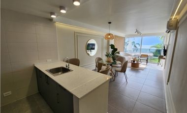 Beachfront at The Palms – 1BR + Den with Ocean Views!