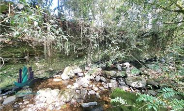 VENDO CASA Y TERRENO DE 1856M2 BORDEADO X RIO EN BOQUERON