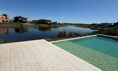 Casa en  alquiler 4 dormitorios al lago
