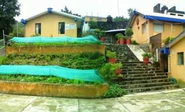VENTA DE TERRENO CON CENTRO EDUCATIVO . VISTA A BOSQUE EN HUIXQUILUCAN
