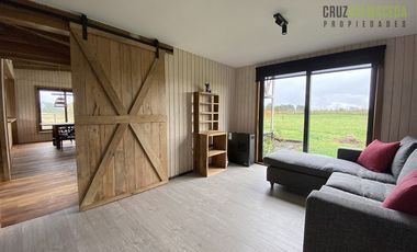 Casa en Venta en Nueva Casa con vista a dos volcanes y acceso a laguna, maderas nativas, impecable