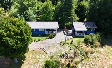 Hermosa parcela con casa y 4 cabañas orilla ruta