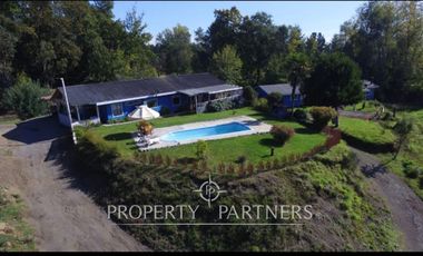 Hermosa parcela con casa y 4 cabañas orilla ruta