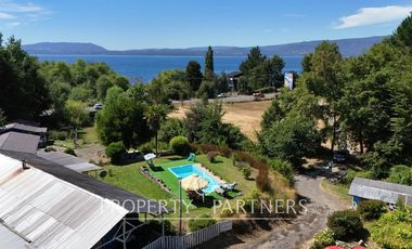 Hermosa parcela con casa y 4 cabañas orilla ruta