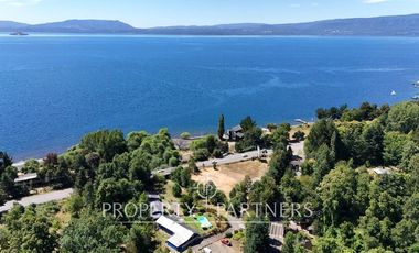 Hermosa parcela con casa y 4 cabañas orilla ruta