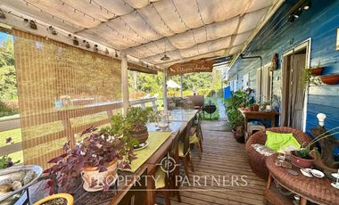 Hermosa parcela con casa y 4 cabañas orilla ruta