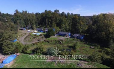 Hermosa parcela con casa y 4 cabañas orilla ruta