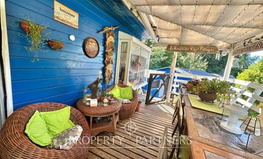 Hermosa parcela con casa y 4 cabañas orilla ruta