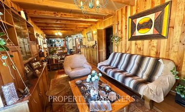 Hermosa parcela con casa y 4 cabañas orilla ruta