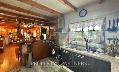 Hermosa parcela con casa y 4 cabañas orilla ruta