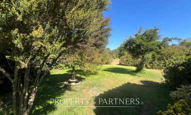 Hermosa parcela con casa estilo español en Huertos de Chile, Santo Domingo.